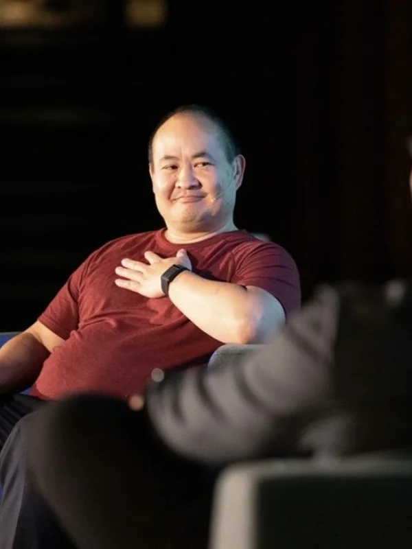 Dennis Yu on stage at GrowthTank